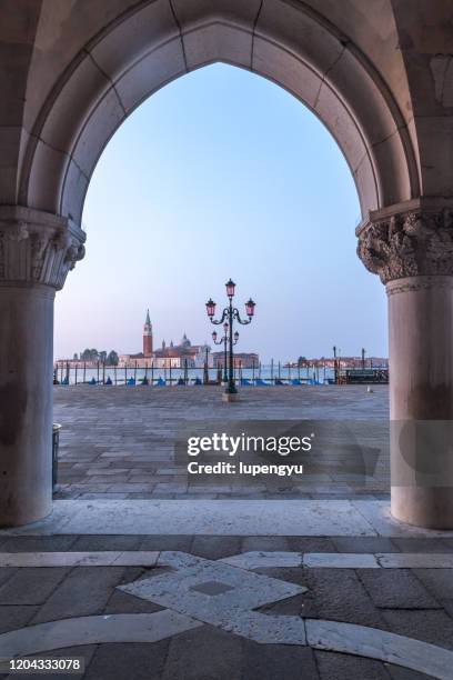 empty street of venice at sunrise - venice italy canal stock pictures, royalty-free photos & images