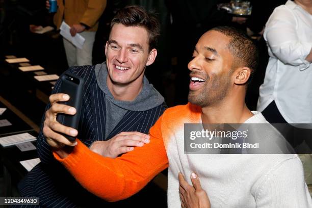 Tyler Cameron and Matt James attend the Todd Snyder show during New York Fashion Week Men's at Pier 59 Studios on February 05, 2020 in New York City.