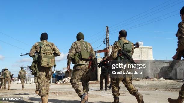 Force members are seen near Jabal al-Zawiya town on March 01, 2020 after moderate opposition reclaims 9 villages in Syriaâs Idlib. The Syrian...