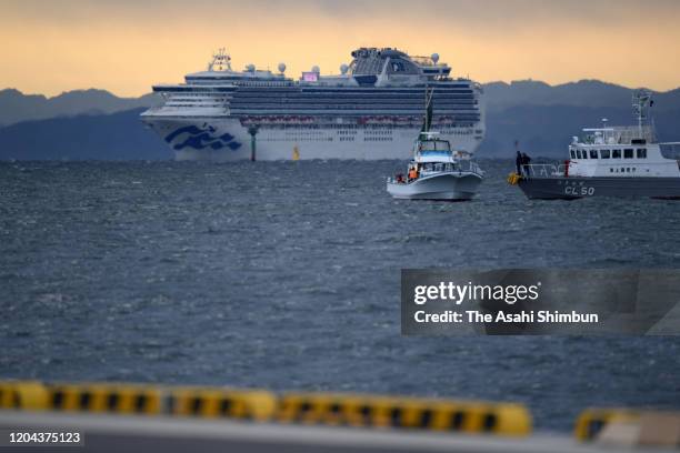 Cruise ship Diamond Princess approaches to Daikoku Pier to stock up on food and supplies on February 6, 2020 in Yokohama, Kanagawa, Japan. According...