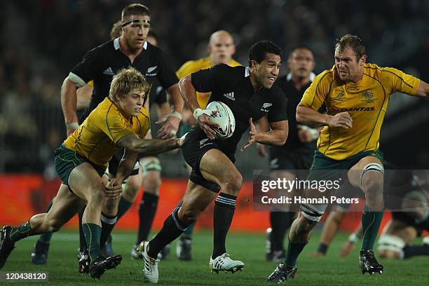 Mils Muliaina of the All Blacks makes a break during the Tri-Nations Bledisloe Cup match between the New Zealand All Blacks and the Australian...