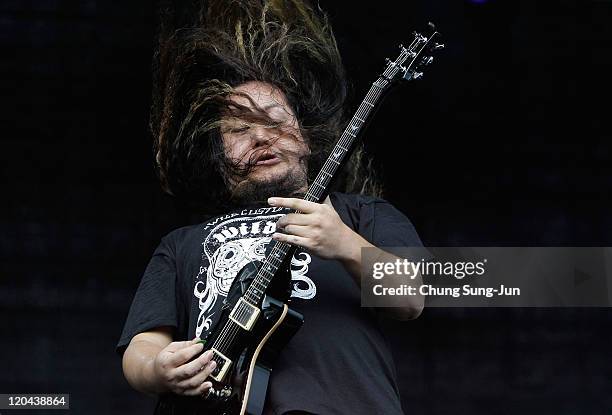 Ryo Kun of Maximum The Hormone performs on stage during the day two of the 2011 Pentaport Rock Festival on August 6, 2011 in Incheon, South Korea.