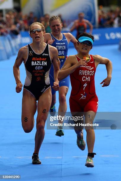 Svenja Bazlen of Germany and Barbara Riveros Diaz of Chile in action during the Women's Elite race during day one of the Dextro Energy Triathlon ITU...
