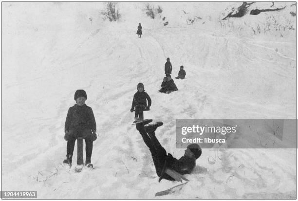 ilustrações, clipart, desenhos animados e ícones de foto antiga do império britânico: tobogã no canadá - tobogganing