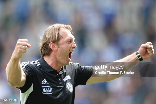 Head coach Ralph Hasenhuettl of Aalen celebrates after the Third League match between Arminia Bielefeld and VfR Ahlen at the Schueco Arena on August...