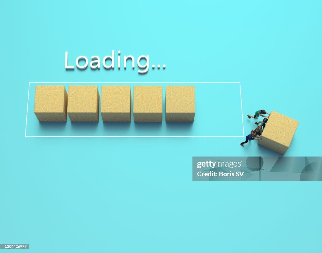 Team pushing wooden cube from the progress bar, loading