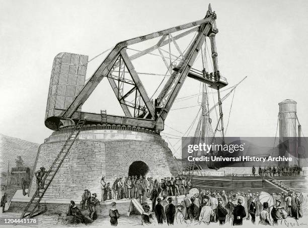Italy. Port of Spezia. Italian navy. Assembly of the huge 100-ton Armstrong cannon on the battleship "Duilio". A large crane designed by an engineer...
