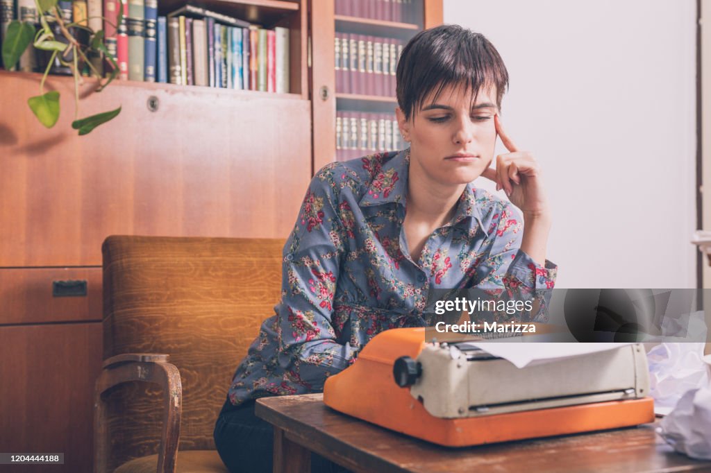 Girl Using Typewriter Woman Writing On Typewriter High-Res Stock Photo - Getty Images