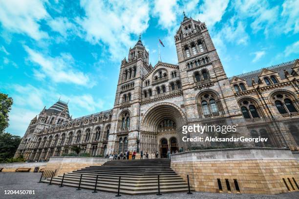 people in front of london national history museum - history museum stock pictures, royalty-free photos & images