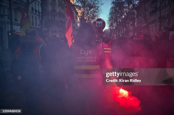 Members of the CGT Union march through the streets of Paris on the 9th inter-professional day of strikes and demonstration against President Macron’s...