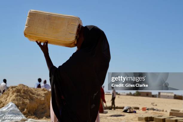 Awaradi Refugee Settlement, Diffa, Niger. December 11 2019. Refugee Girl Drinking Water In Niger