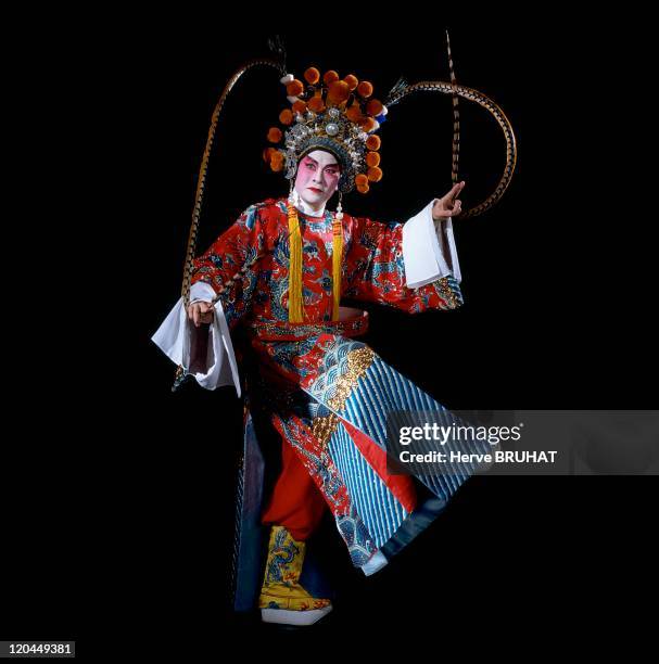 Chinese Opera in China - Cantonese opera. Zhuhai group. The player Yao Zhiqiang in a military role. At first, Cantonese opera was divided into ten...