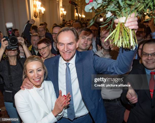 March 2020, Saxony, Leipzig: Burkhard Jung , Lord Mayor of Leipzig and candidate of the SPD for the Lord Mayor's election, cheers when entering the...