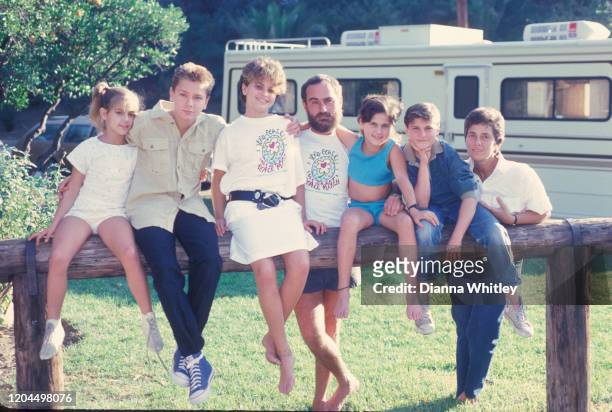 The Phoenix Family next to the RV they travel in when they do missionary work, at their home in Los Angeles, California, US, circa 1986; L-R Summer...