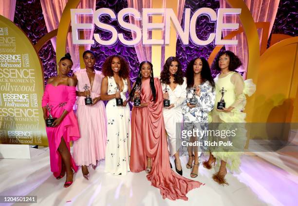 Honorees Angelica Ross, Lashana Lynch, Janet Mock, Niecy Nash, Hailie Sahar, Mj Rodriguez, and Melina Matsoukas pose onstage during the 2020 13th...