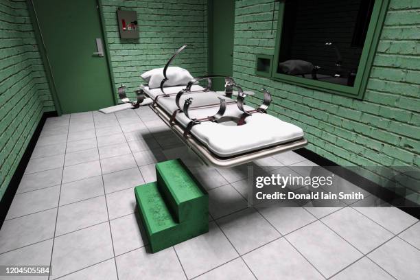 isolation room with bed and straps for tying subject down - équipement de privation de liberté photos et images de collection