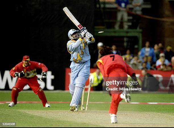 Javagal Srinath of India is bowled by Henry Olonga of Zimbabwe during the Cricket World Cup Group A match played in Leicester, England. Zimbabwe won...