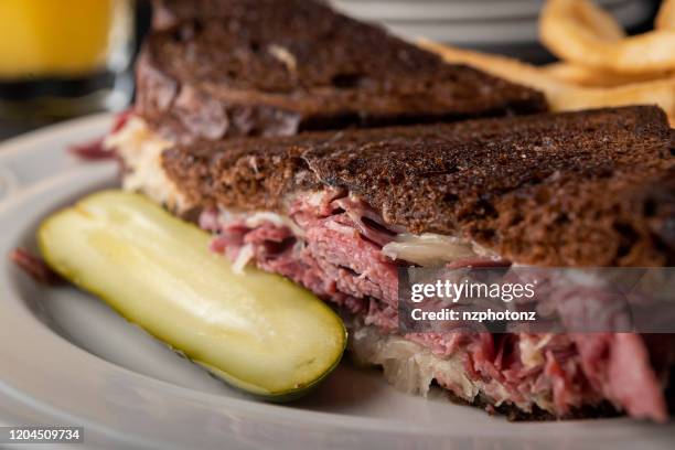 reuben sandwich with pastrami (click for more) - reiben stock pictures, royalty-free photos & images