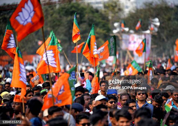 Supporters holding BJP flags during the CAA Support rally in kolkata.