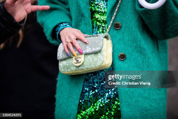 Guest is seen with colored nails wearing Chanel bag outside Tadashi Shoji during New York Fashion Week February 2020 on February 06, 2020 in New York...