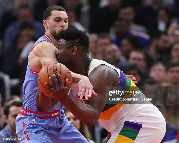 Zion Williamson of the New Orleans Pelicans is fouled by Zach LaVine of the Chicago Bulls at the United Center on February 06, 2020 in Chicago,...