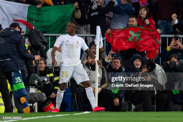 Vinicius Jr. Of Real Madrid celebrates after scoring his team's first goal during the Liga match between Real Madrid CF and FC Barcelona at Estadio...