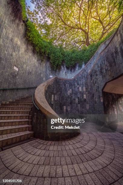 the spiral staircase of the garden in fort canning park, singapore - canning stock pictures, royalty-free photos & images