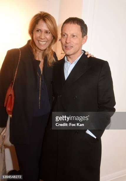 Presenters Rachel Bourlier and Marc Olivier Fogiel attend "Paparazzi" Bruno Mouron et Pascal Rostain Exhibition preview and “Autopsie” book signing...