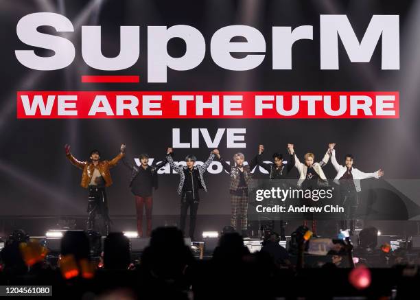Singers Taemin, Baekhyun, Kai, Taeyong, Ten, Mark and Lucas of K-pop supergroup SuperM perform on stage at Rogers Arena on February 06, 2020 in...