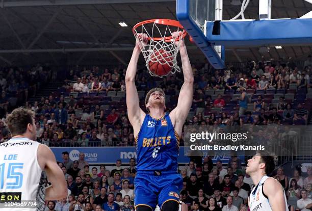 Matthew Hodgson of the Bullets slam dunks during the round 19 NBL match between the Brisbane Bullets and the New Zealand Breakers at Nissan Arena on...