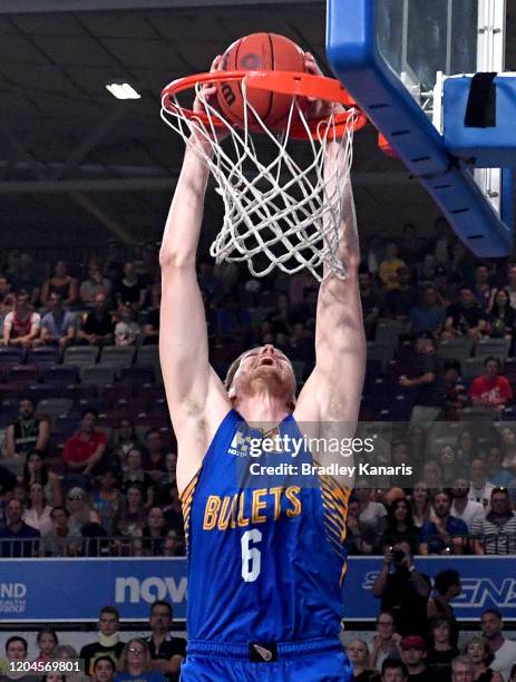 Matthew Hodgson of the Bullets slam dunks during the round 19 NBL match between the Brisbane Bullets and the New Zealand Breakers at Nissan Arena on...