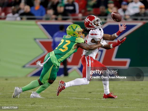 Wide Receiver Rashad Ross of the DC Defenders make a catch across the middle of the field over Anthoula Kelly of the Tampa Bay Vipers during the XFL...