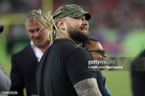 Wrestler Bray Wyatt watches from the sideline during the XFL game between the DC Defenders and Tampa Bay Vipers on March 01, 2020 at Raymond James...