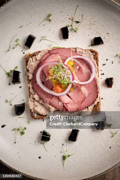 roast beef smorrebrod sandwich - danish culture stock pictures, royalty-free photos & images