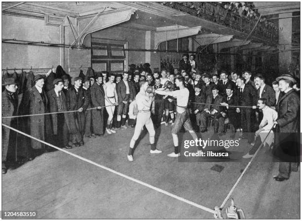 antique photograph of the british empire: boxing at the regent street polytechnic - memories box stock illustrations