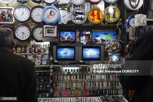 Little store selling real clocks and false televisions in Istanbul, Turkey.