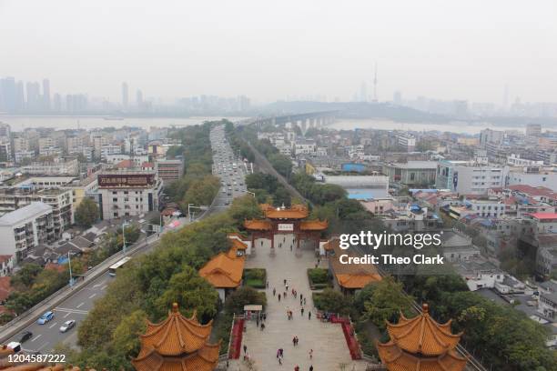 wuhan skyline from yellow crane tower - wuhan stock-fotos und bilder