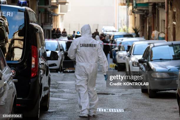Agostino Alessandro Migliore killed in a mafia ambush, at dawn under his house. He was the brother of a mafia boss currently in prison. On the scene...