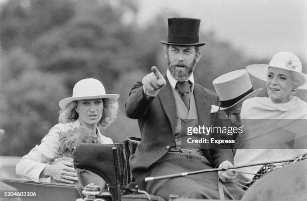 Prince Michael of Kent driving a carriage with his wife, Princess Michael of Kent, and their son, Lord Frederick Windsor, UK, 24th June 1985.