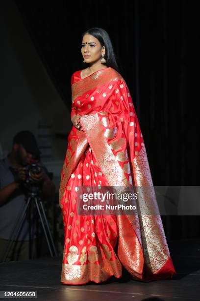 Indian fashion model showcases an elegant and ornate Kanchipuram saree during a South Indian and Sri Lankan bridal fashion show in Ontario, Canada,...