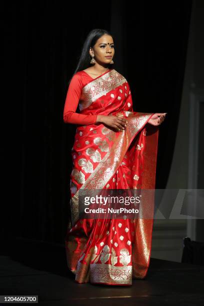 Indian fashion model showcases an elegant and ornate Kanchipuram saree during a South Indian and Sri Lankan bridal fashion show in Ontario, Canada,...