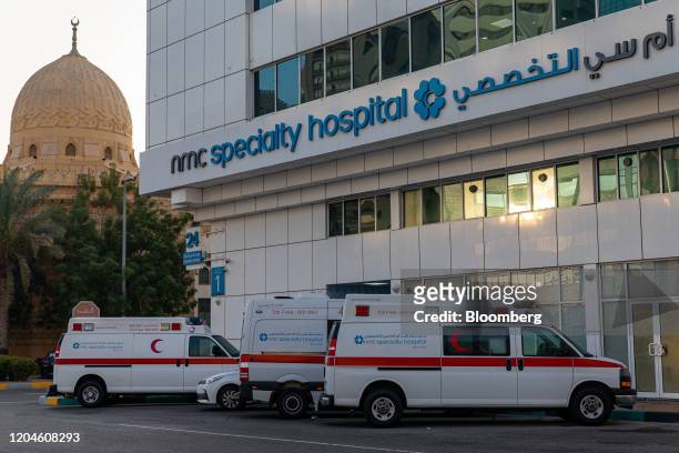 Ambulances sit outside the NMC Speciality Hospital, operated by NMC Health Plc, in Dubai, United Arab Emirates, on Sunday, March 1, 2020....