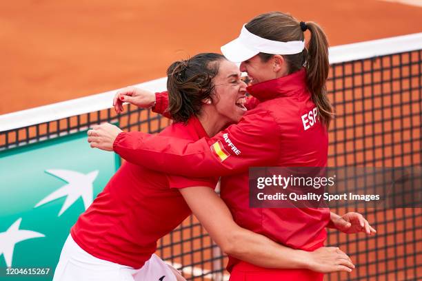 Sara Sorribes of Spain celebrates with Anabel Medina, Captain of Spain after winning her match against Naomi Osaka of Japan during the 2020 Fed Cup...