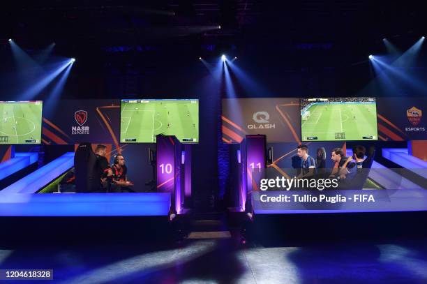 Haroun Yassin and Ramy Abdelaal of Nasr eSports team and Diego Campagnani and Ivan Todorov Churov of Team QLASH compete during the FIFA eClub World...