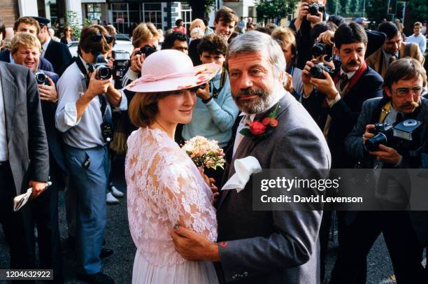 Oliver Reed, actor, marries Josephine Burge, at Epsom, Surrey, England on September 7, 1985.