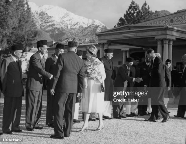 Miangul Jahan Zeb , the Wali of the princely state of Swat, presents his ministers to Queen Elizabeth II at the Royal Palace in Saidu Sharif during...
