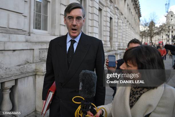 Britain's Leader of the House of Commons Jacob Rees-Mogg is interviewed by Sky News journalist Beth Rigby as he leaves from the Cabinet Office on...