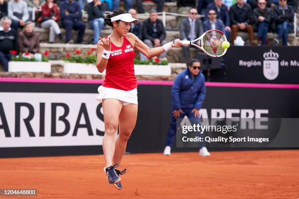 Misaki Doi of Japan returns the ball during her match against Carla Suarez of Spain during the 2020 Fed Cup Qualifier between Spain and Japan at...