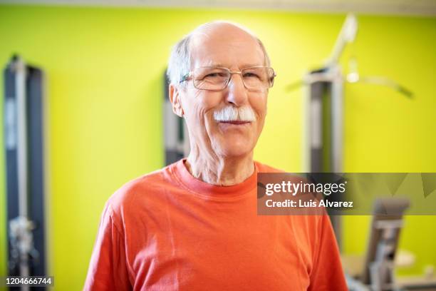 portrait of a senior man at rehab center - fitness center ストックフォトと画像