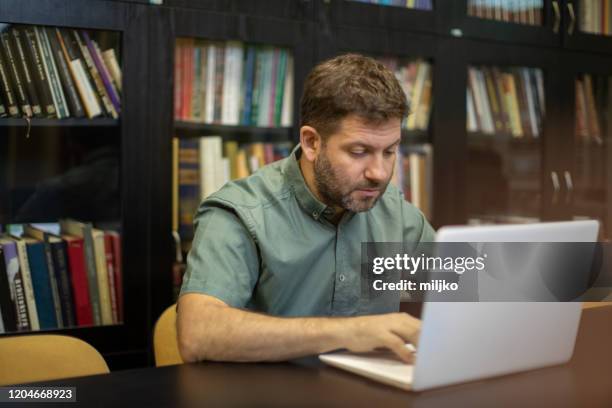 Guy In Library Older Man In Library Photos and Premium High Res Pictures - Getty Images
